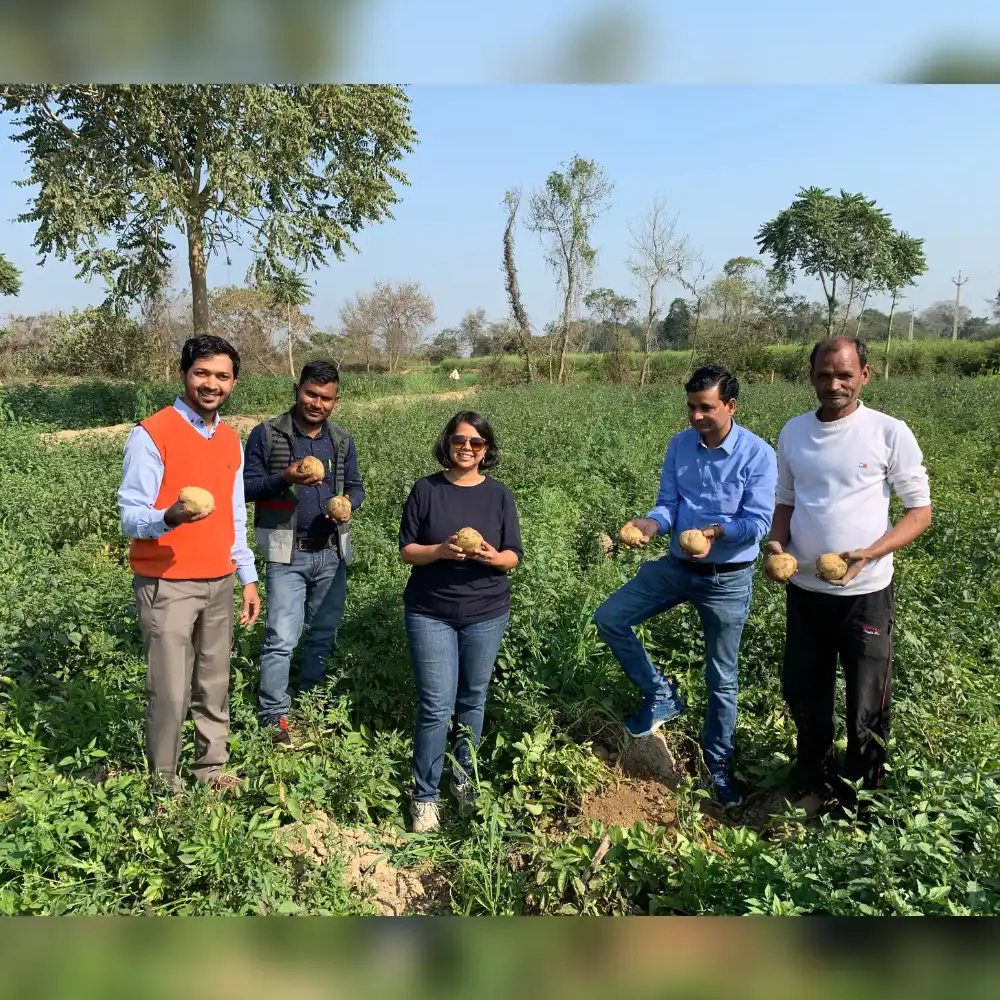 Dr. Karandikar at the farm with her colleagues