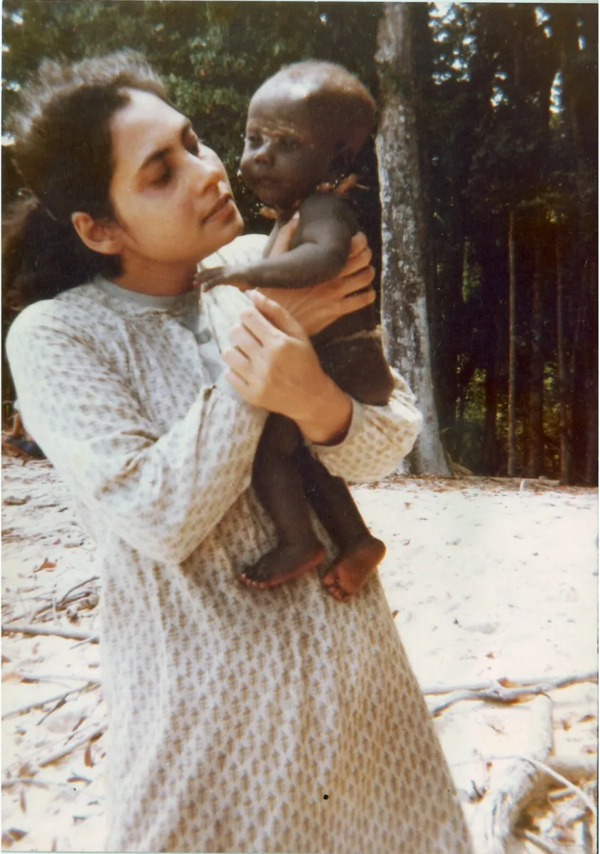 Madhumala with a 3-month-old Jarawa baby in 1991