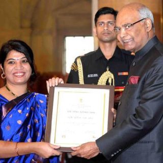 Dr Purnima Devi Barman receiving the Nari Shakti Award from the President of India - 2018
